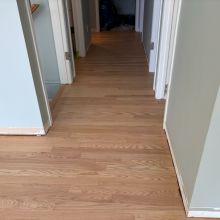 Red Oak refinished with one coat of Berger Seidle Natural White Finish and one coat of Ceramic Star finish for the bare wood look. 