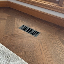 Top Step Vents - Cast Iron Black Lattice in oak