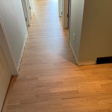 Red Oak refinished with one coat of Berger Seidle Natural White Finish and one coat of Ceramic Star finish for the bare wood look. 