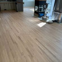 Red Oak refinished with one coat of Berger Seidle Natural White Finish and one coat of Ceramic Star finish for the bare wood look. 
