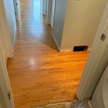 Red Oak refinished with one coat of Berger Seidle Natural White Finish and one coat of Ceramic Star finish for the bare wood look. 