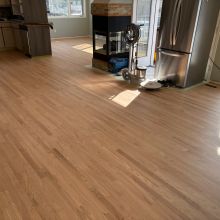 Red Oak refinished with one coat of Berger Seidle Natural White Finish and one coat of Ceramic Star finish for the bare wood look. 
